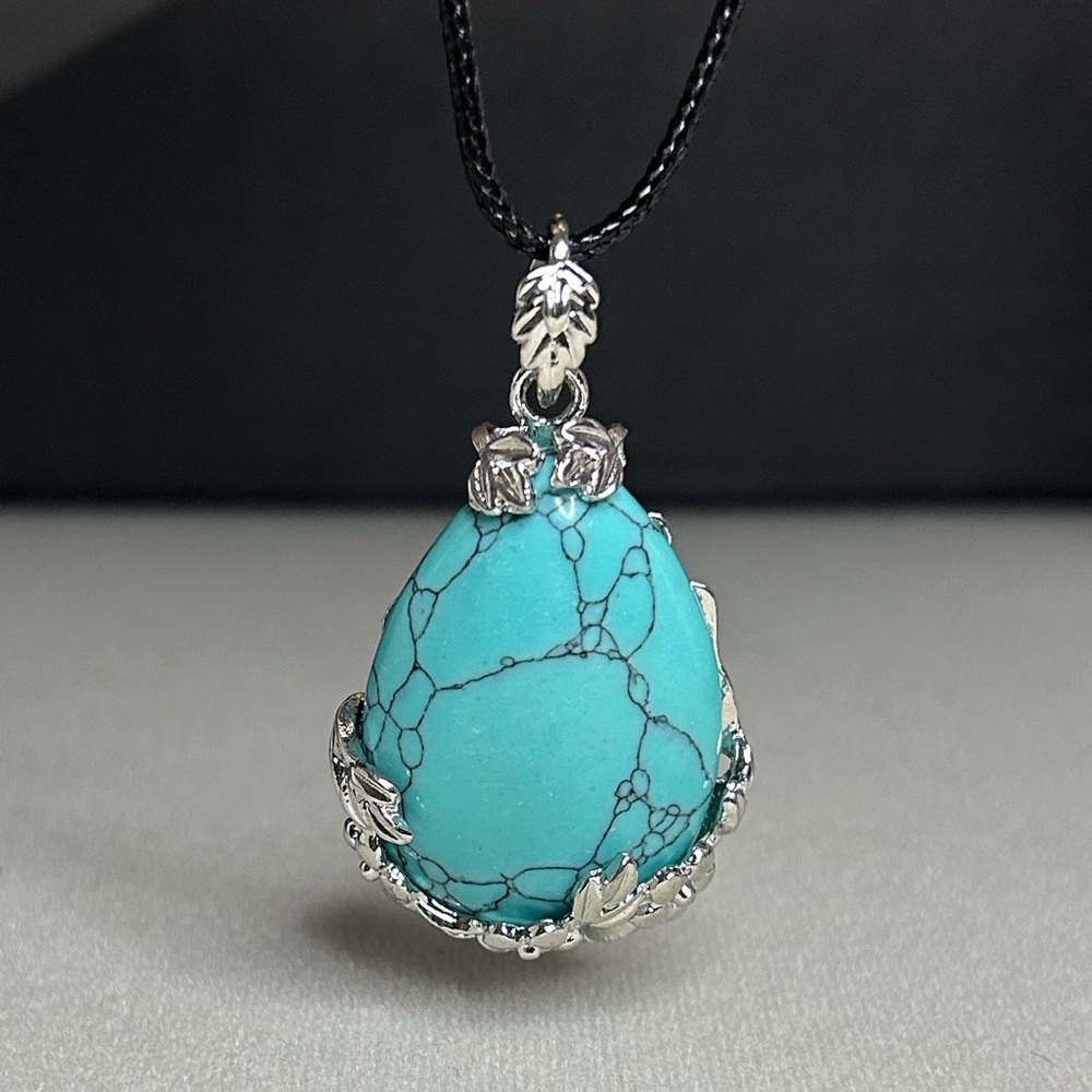 Elegant Silver and Turquoise Pendant Necklace
